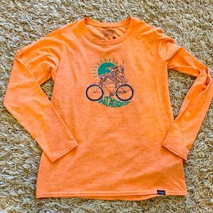 Patagonia Capilene Long sleeve Womens Size Small with bicycle graphic
